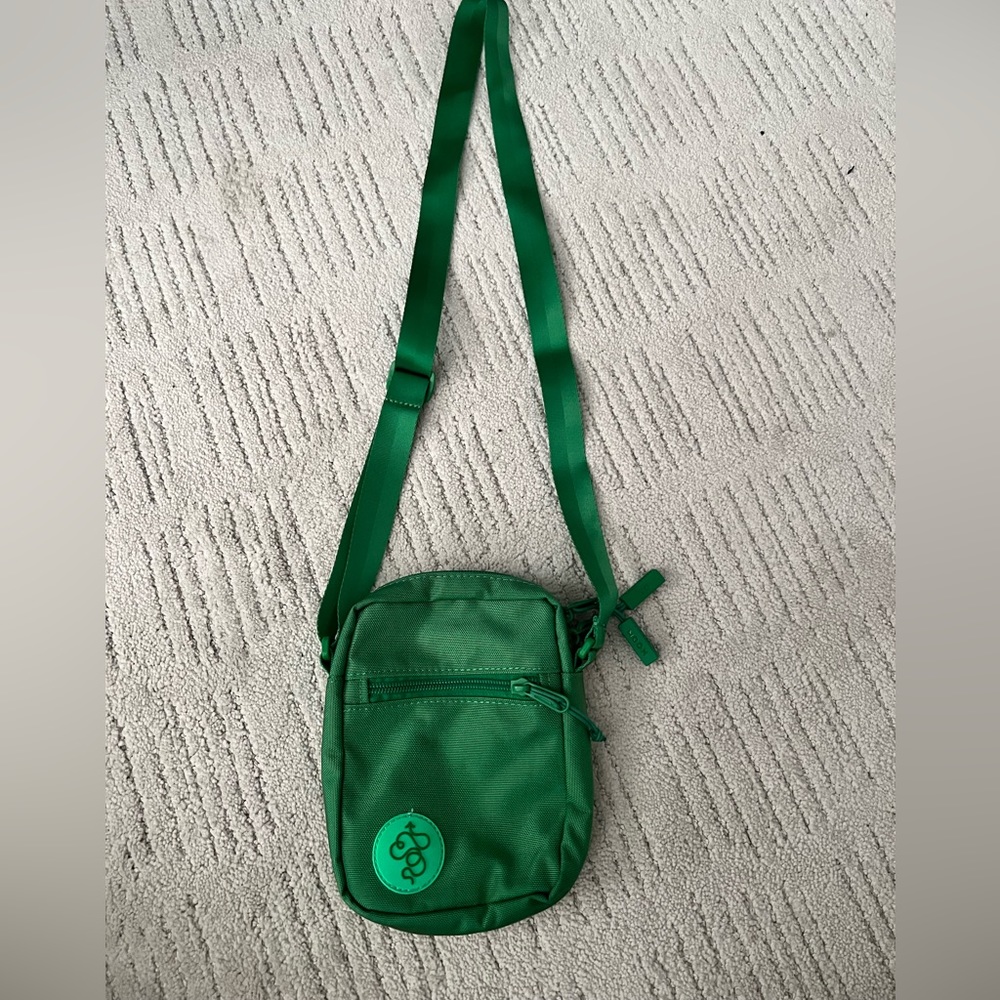BABOON TO THE MOON SLING BAG.